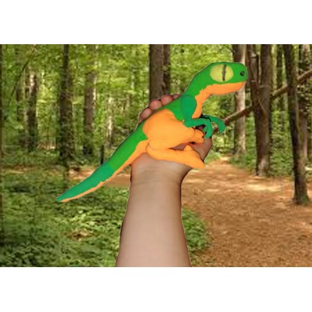 green and orange baby atrociraptor